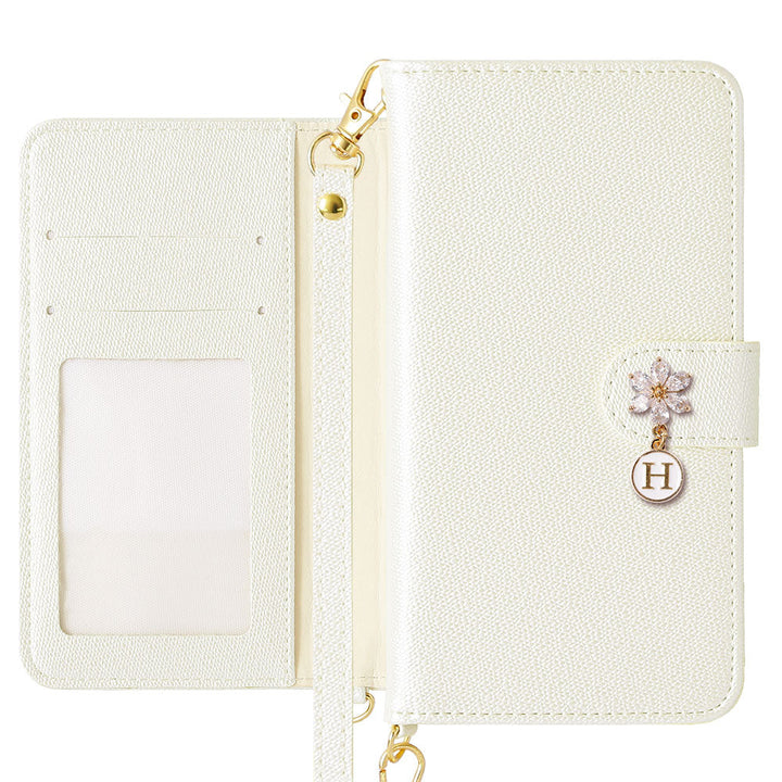 Étui portefeuille avec sangle, breloque initiale fleur en cuir végan couleur perle