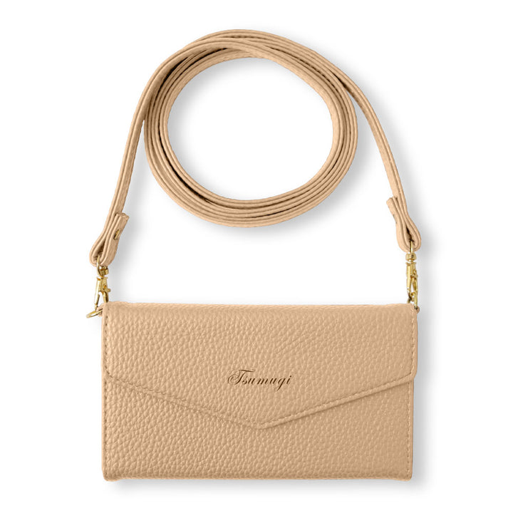 Vegan leather tri-fold dusty color printed name strap attached notebook-style case