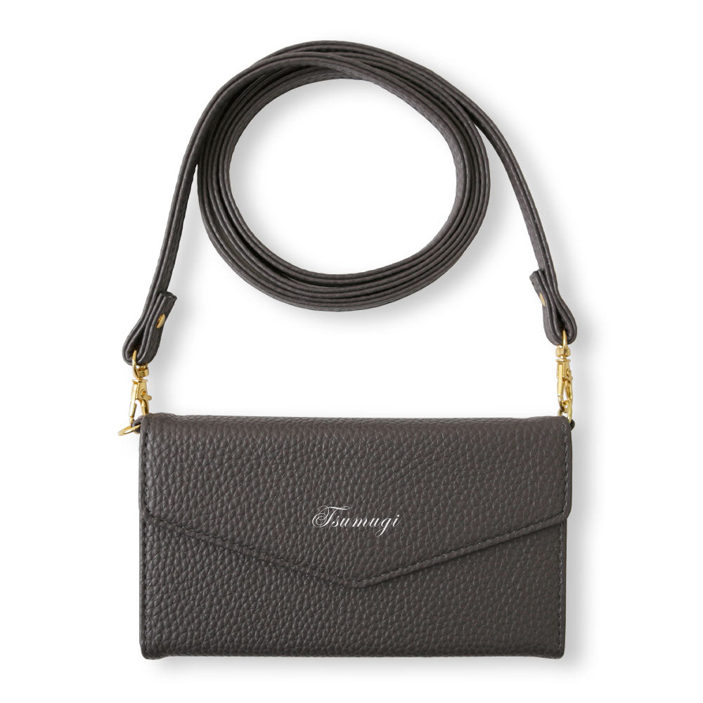 Vegan leather tri-fold dusty color printed name strap attached notebook-style case