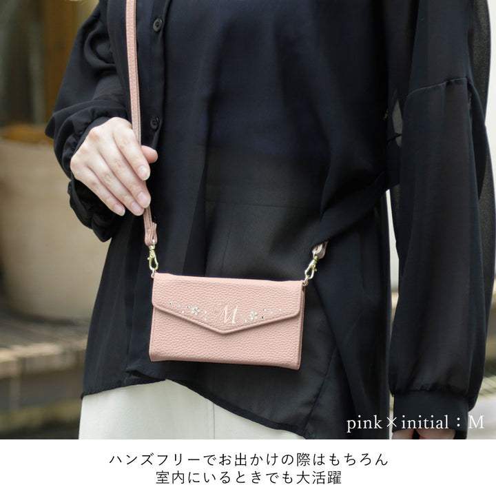 Vegan leather tri-fold dusty color initial deco strap-attached notebook-style case