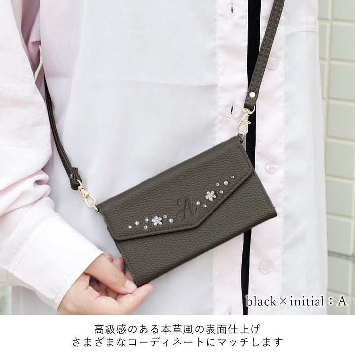 Vegan leather tri-fold dusty color initial deco strap-attached notebook-style case