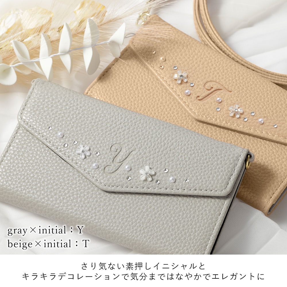 Vegan leather tri-fold dusty color initial deco strap-attached notebook-style case