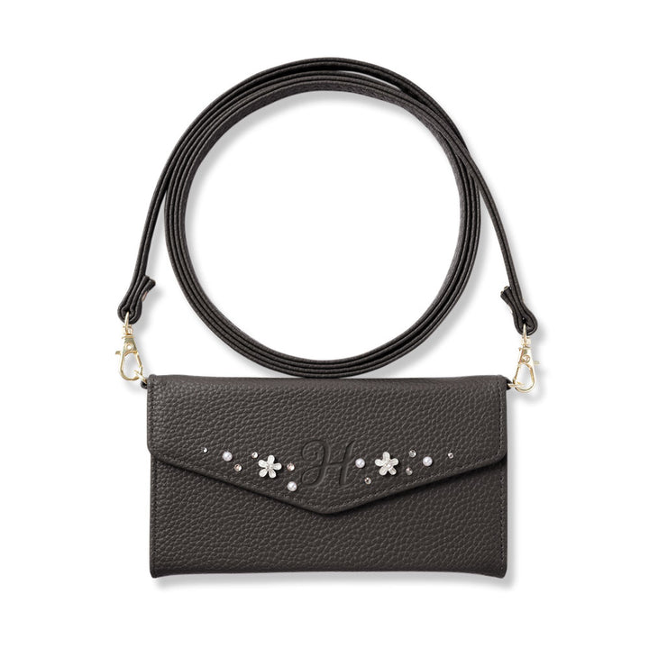 Vegan leather tri-fold dusty color initial deco strap-attached notebook-style case