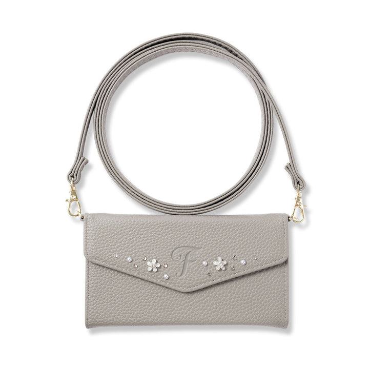 Étui portefeuille à rabat triple en cuir végan couleur poussiéreuse avec décoration d'initiales et sangle pour la série AQUOS