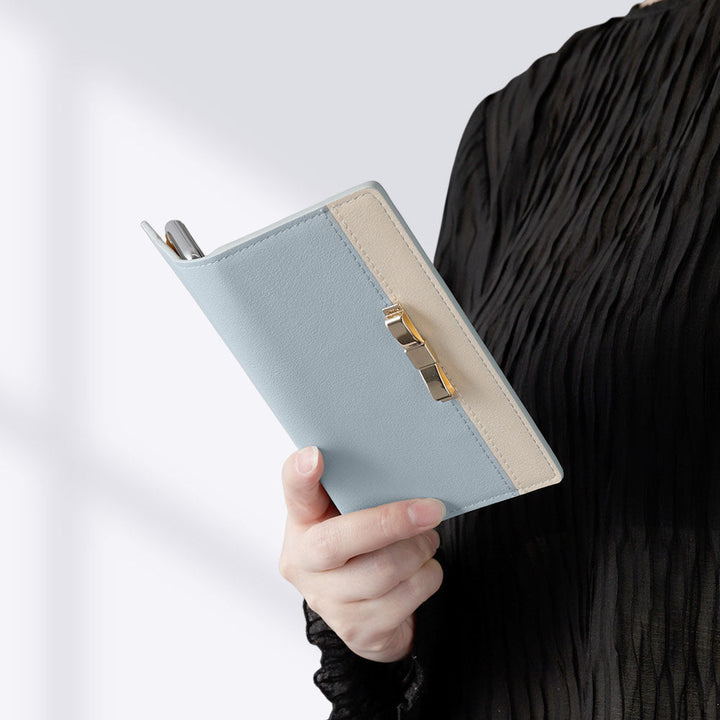 ヴィーガンレザー 表バイカラー ゴールドリボンデコ スタンド機能 手帳型ケース