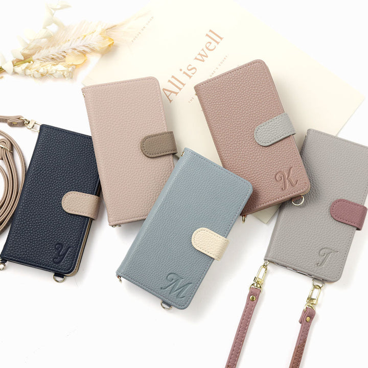 ヴィーガンレザー バイカラー イニシャル スタンド機能 ショルダーストラップ付き 手帳型ケース（ベルトあり）