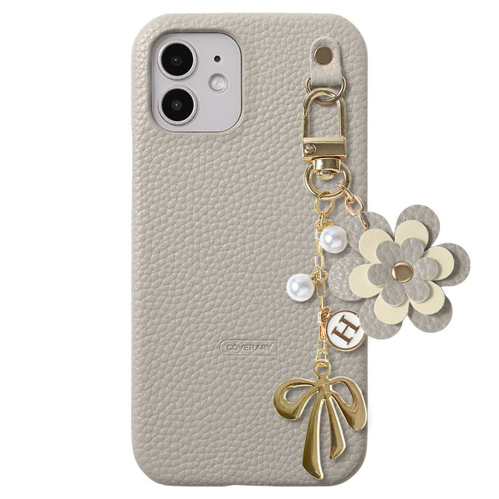Étui arrière en cuir végan texturé avec breloque fleur, ruban et décoration initiale