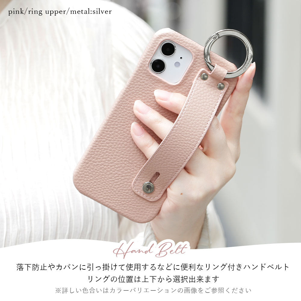 Vegan leather with embossed texture, hand strap attached, back case