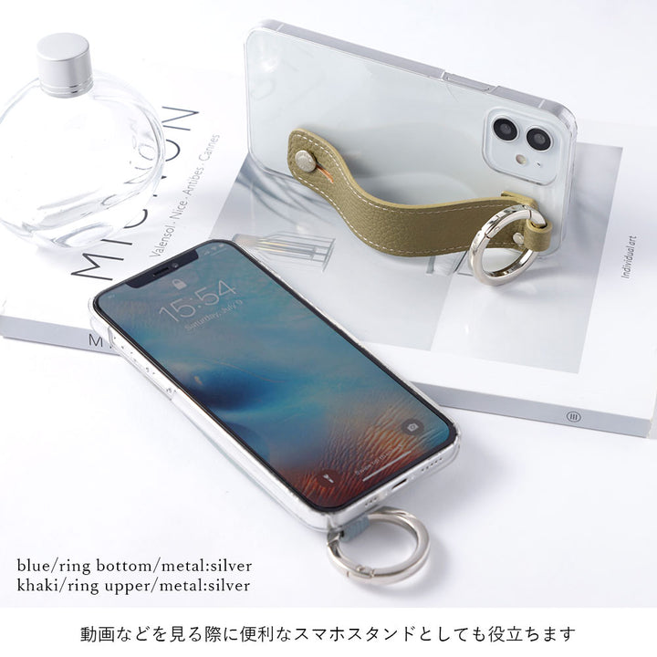 Clear case with textured finish, smoky color, with hand belt, back case