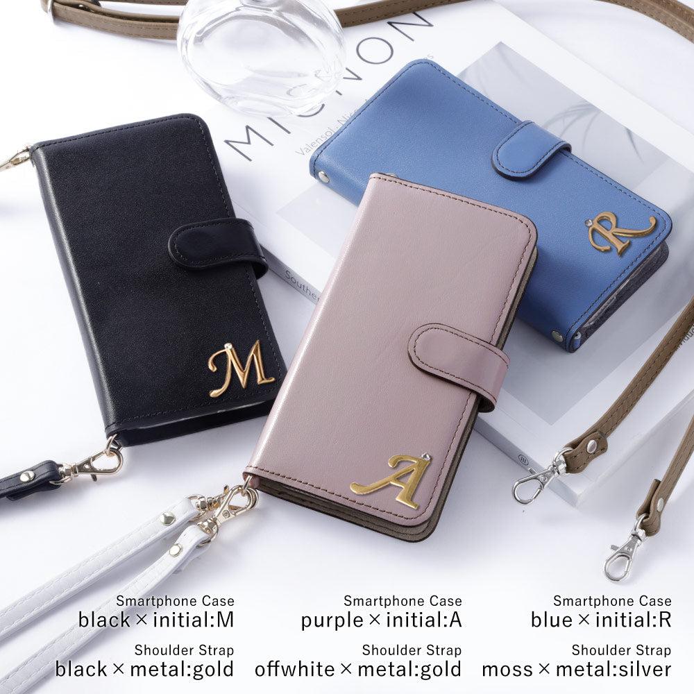 Étui portefeuille en cuir véritable Domani lisse avec bandoulière, décoration initiale, fonction support (avec ceinture) pour la série iPhone