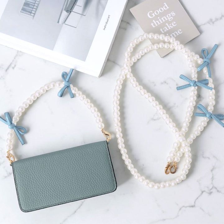 Sangle courte et bandoulière en cuir avec nœud et perles