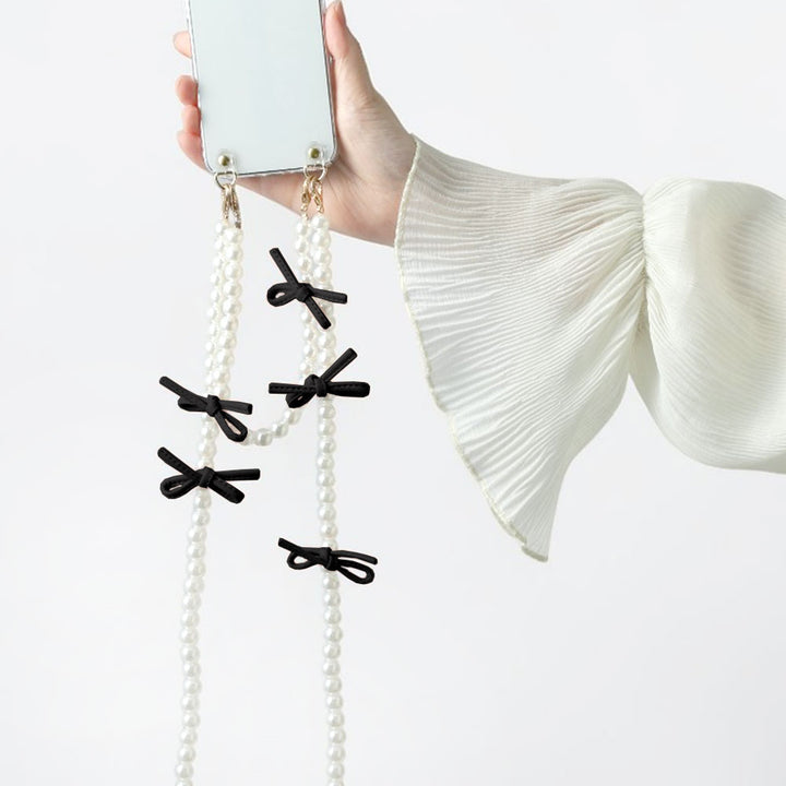 Sangle courte et bandoulière en cuir avec nœud et perles