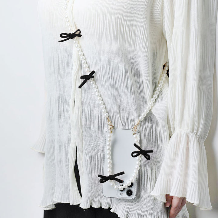 Sangle courte et bandoulière en cuir avec nœud et perles