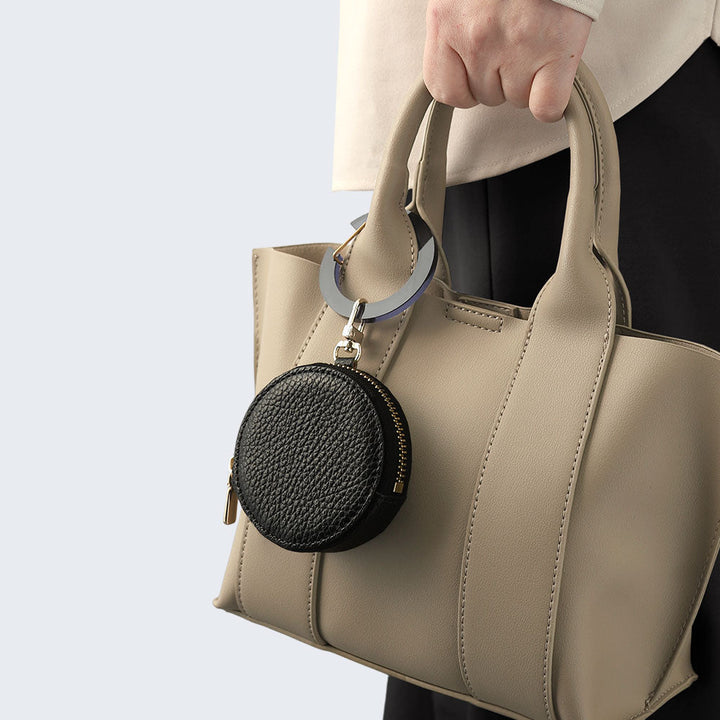 Pochette ronde en cuir véritable italien grainé