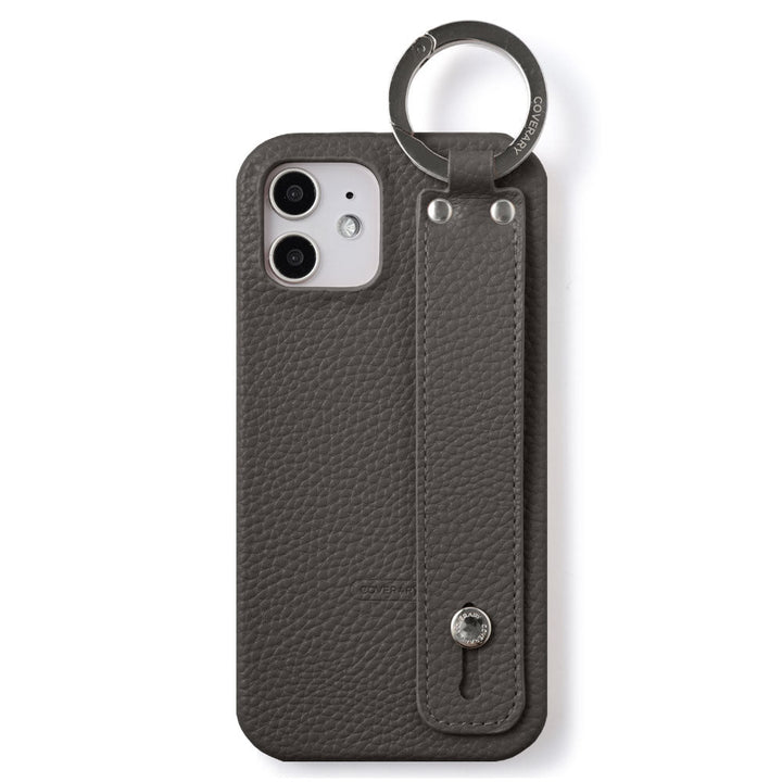 Vegan leather with embossed texture, hand strap attached, back case