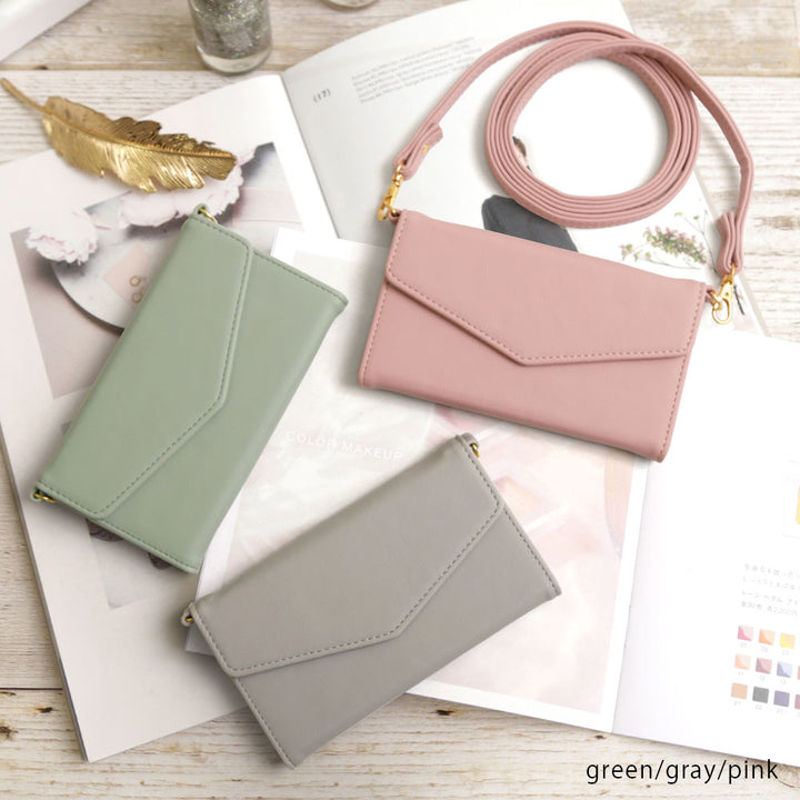 Vegan leather tri-fold muted pastel strap-attached notebook-style case